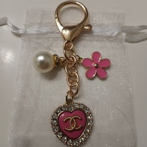 Luxury charm pink rhinestone heart button on an unbranded keychain
